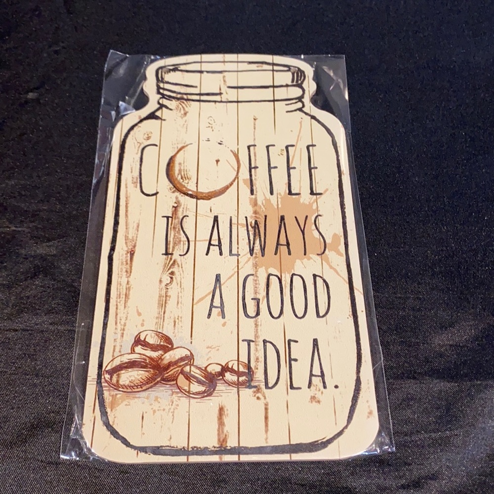 Wooden mason jar shaped sign; coffee is always a good. Includes twine string.